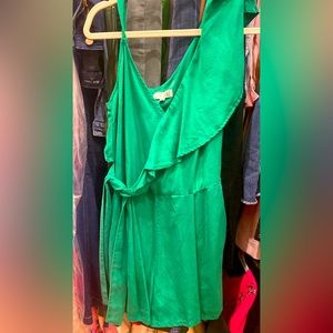 Vibrant green ruffle shoulder romper never worn. Without tags